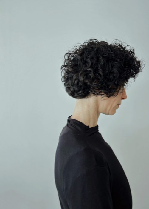 Curly corto